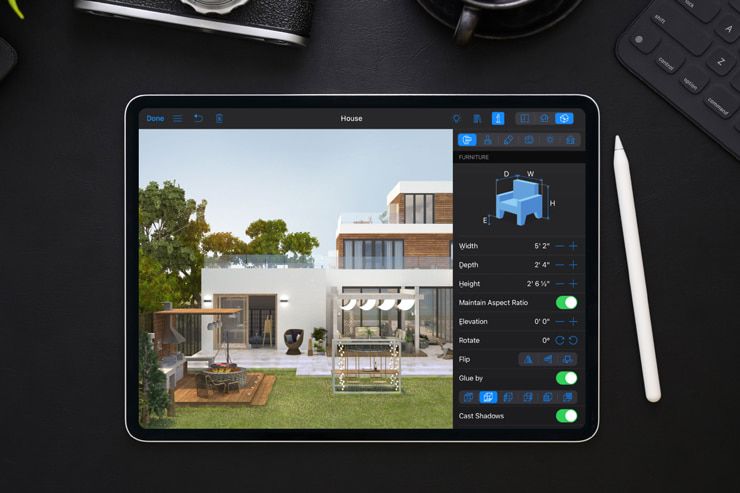 A screenshot of a project with a house and a backyard opened in Live Home 3D for iPad