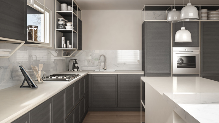 A small kitchen in a smoky grey color scheme.