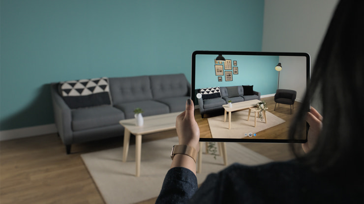 https://www.livehome3d.com/assets/img/articles/ai-in-interior-design/apple-ipad-pro-demonstrating-lidar-technology.jpg