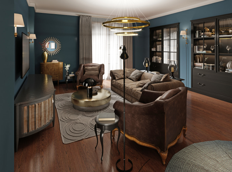 Living room in dark colors, with a soft leather sofa and an armchair.
