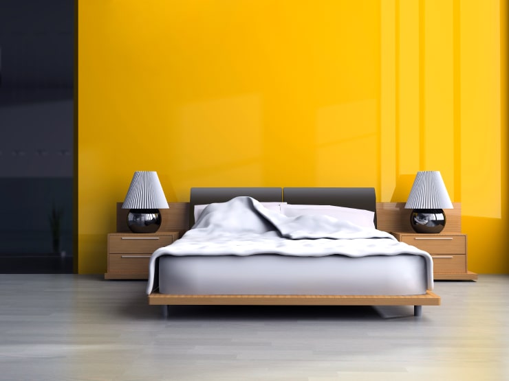 A bedroom with orange walls