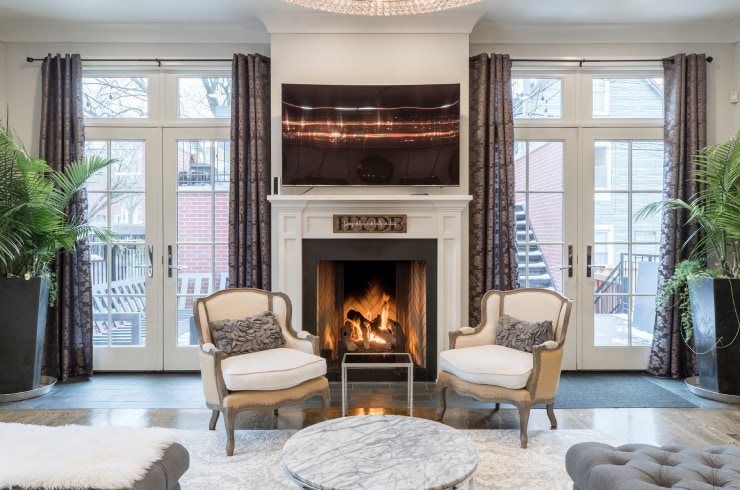 A light living room with a fireplace.