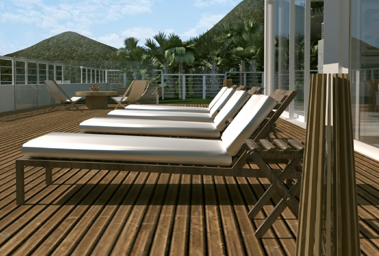 A sun terrace with the sun chairs with the hill in the background designed in Live Home 3D Pro.
