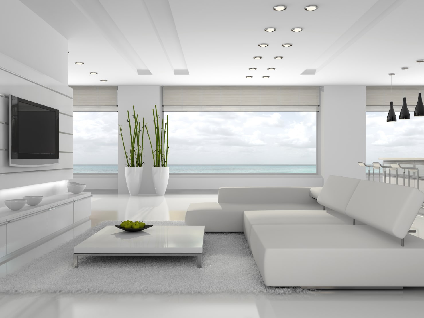 A stylish living room in white colors designed following feng shui rules.
