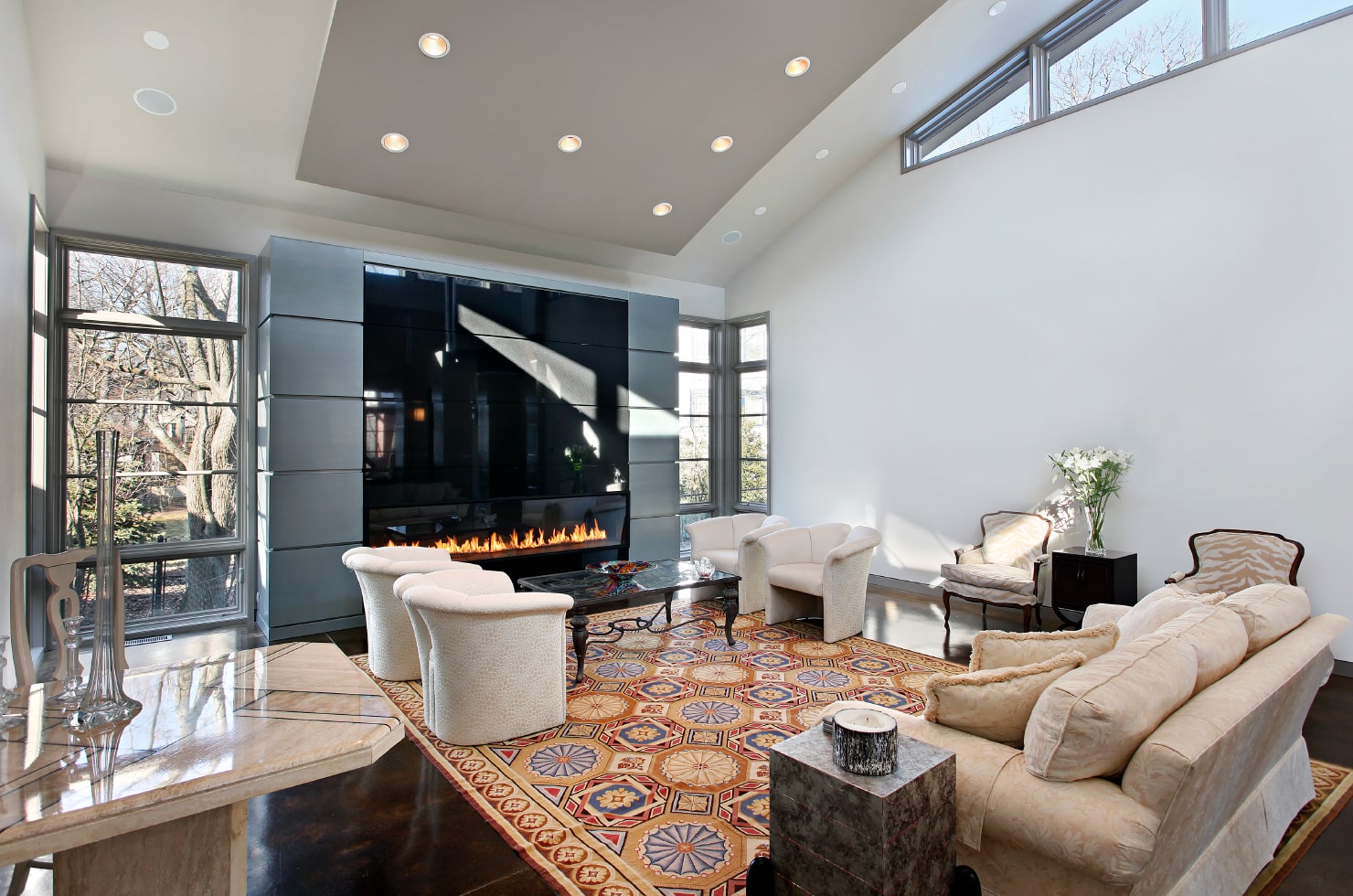 Bright living room with a glass fireplace.