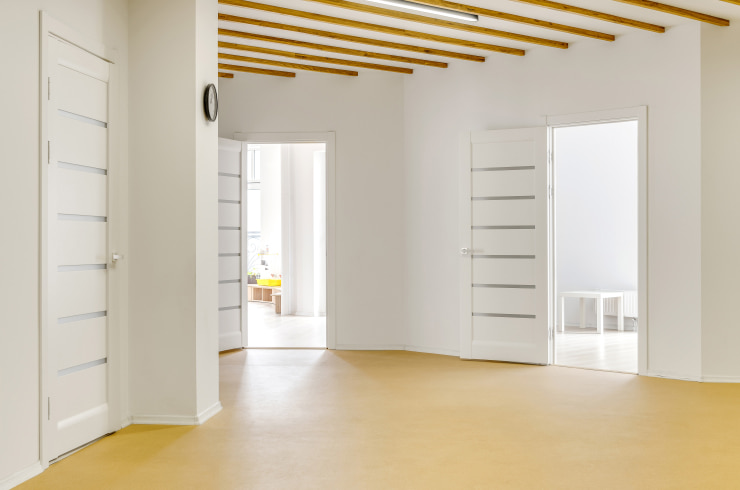 Large hallway with several doors.