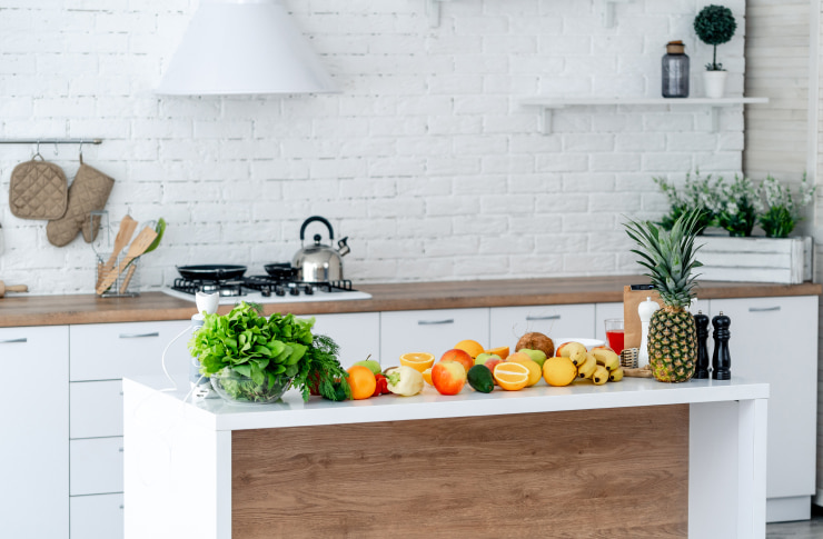 Modern kitchen countertop with groceries.