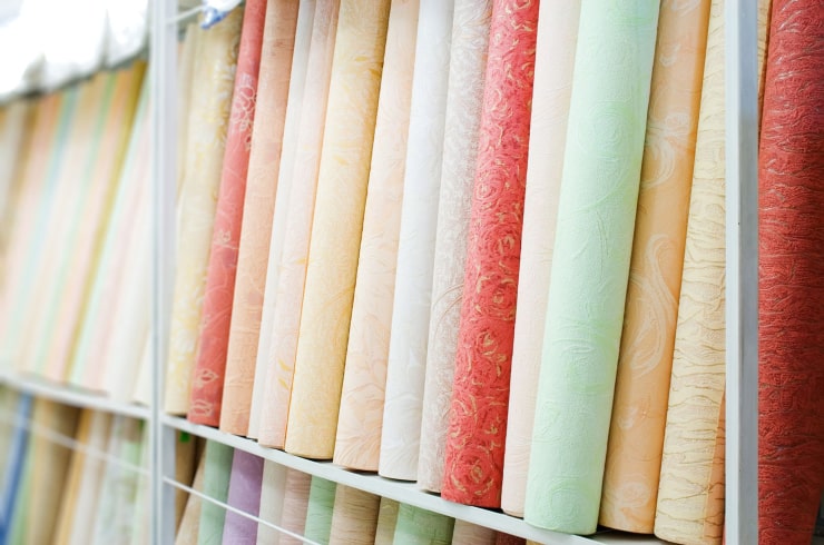 Rolls of wallpaper in a store.