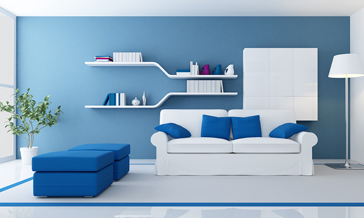 A living room designed in blue and white colors