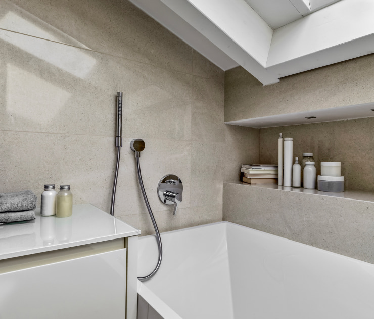 Tiny bathroom with a built-in niche.