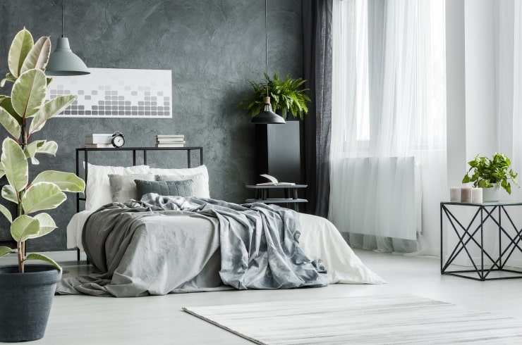 A contemporary bedroom in gray tones.