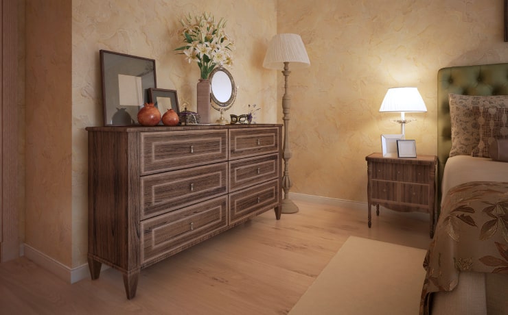 A traditional bedroom with oak furniture.