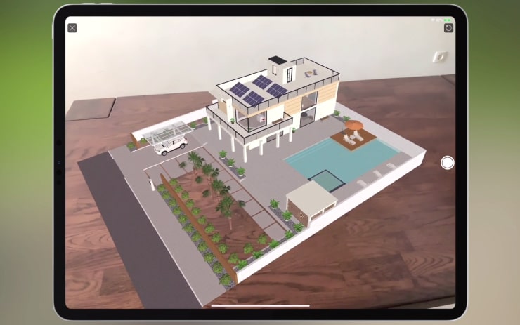 A 3D home model viewed on a table top with the help of AR (augmented reality) technology in Live Home 3D