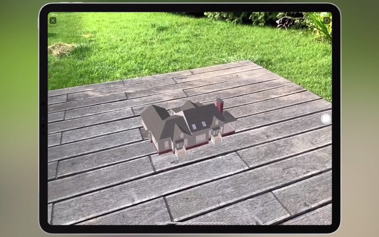 Viewing a home model in AR (augmented reality) in Live Home 3D on iPad