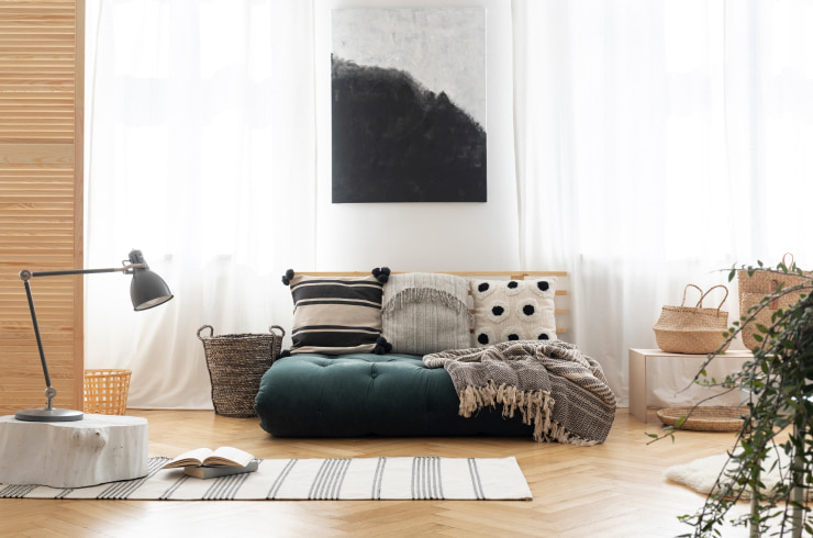 A cozy place to read in wabi-sabi style.