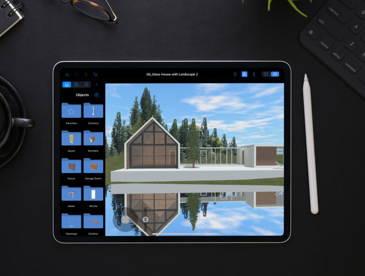 An Apple pencil laying near an iPad with the Live Home 3D app opened on it.