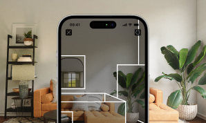 Scan a room using the Room Scanner feature of Live Home 3D on an iPhone.